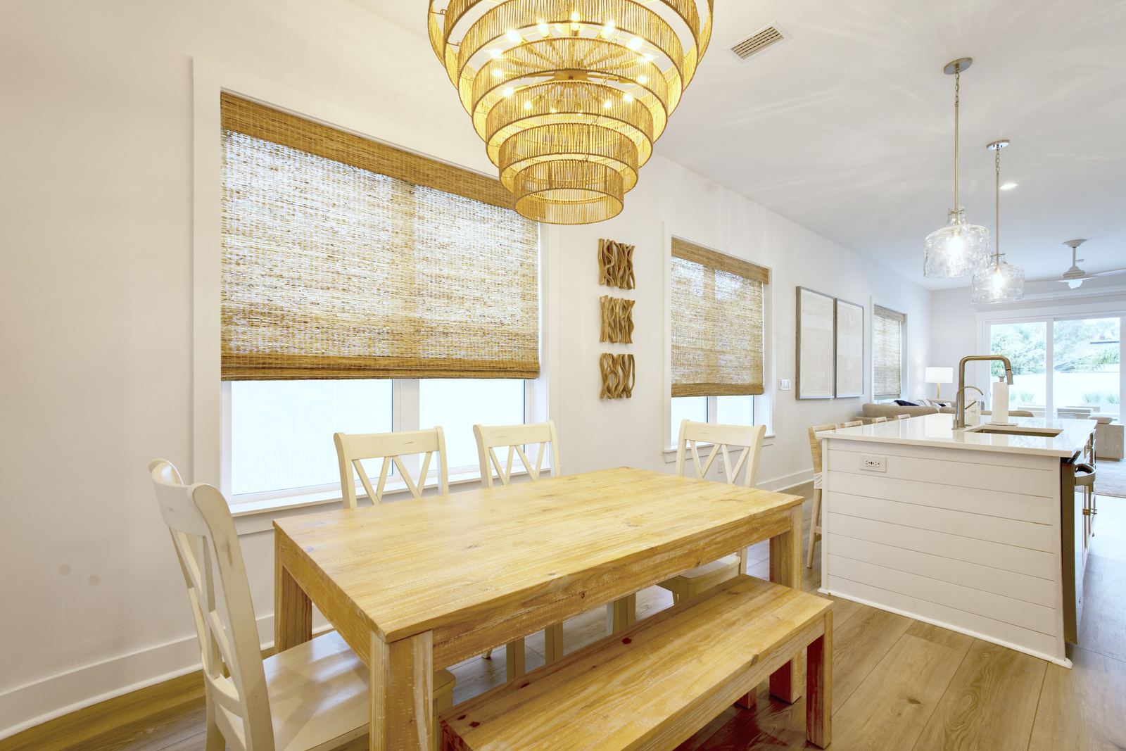 Dining table and kitchen beyond