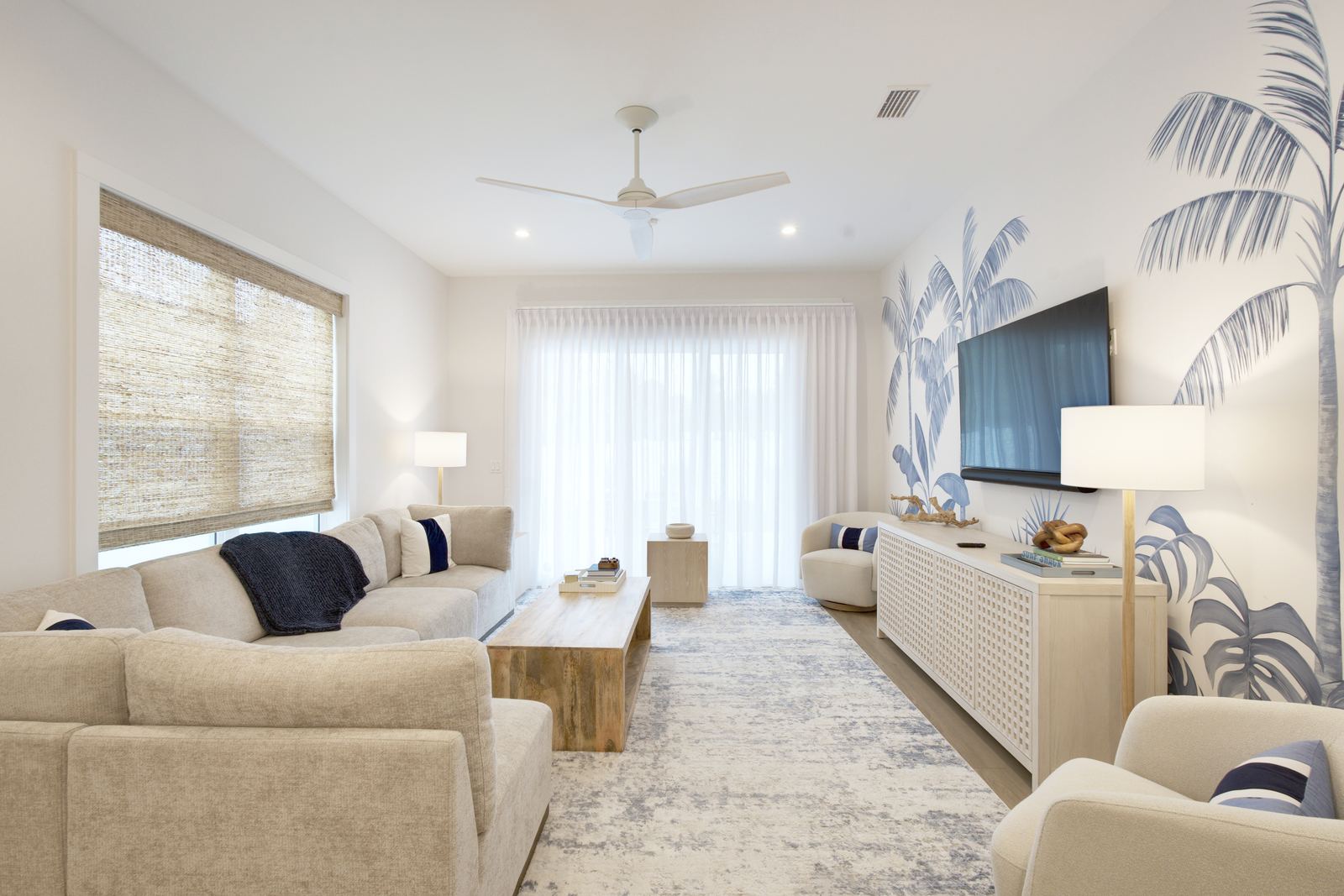 Living room of a Jacksonville Beach rental opening onto the patio
